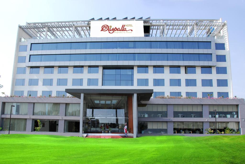 a large building with a sign on top of it at Daspalla Hyderabad in Hyderabad