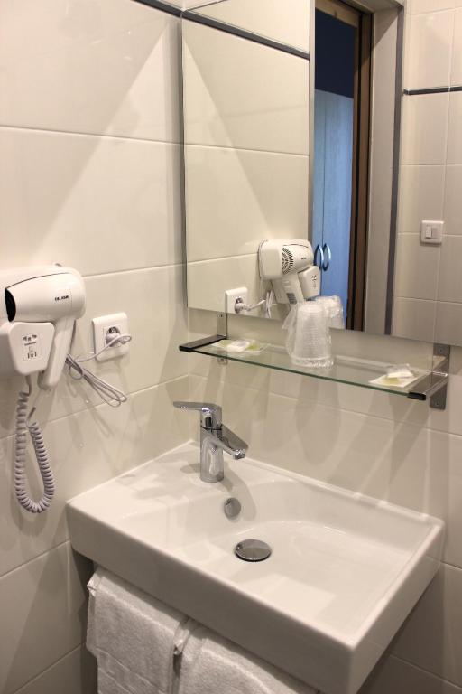 Koupelna v ubytování Hotel Arcu Di Sole