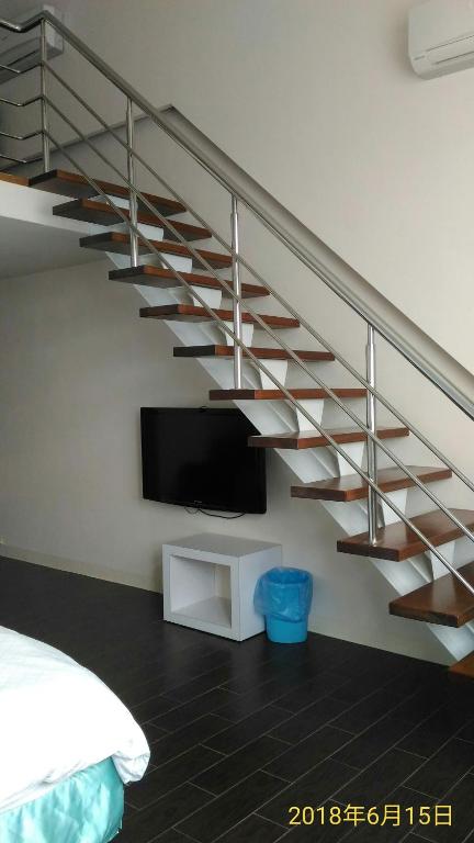 TV a/nebo společenská místnost v ubytování SKY square Homestay