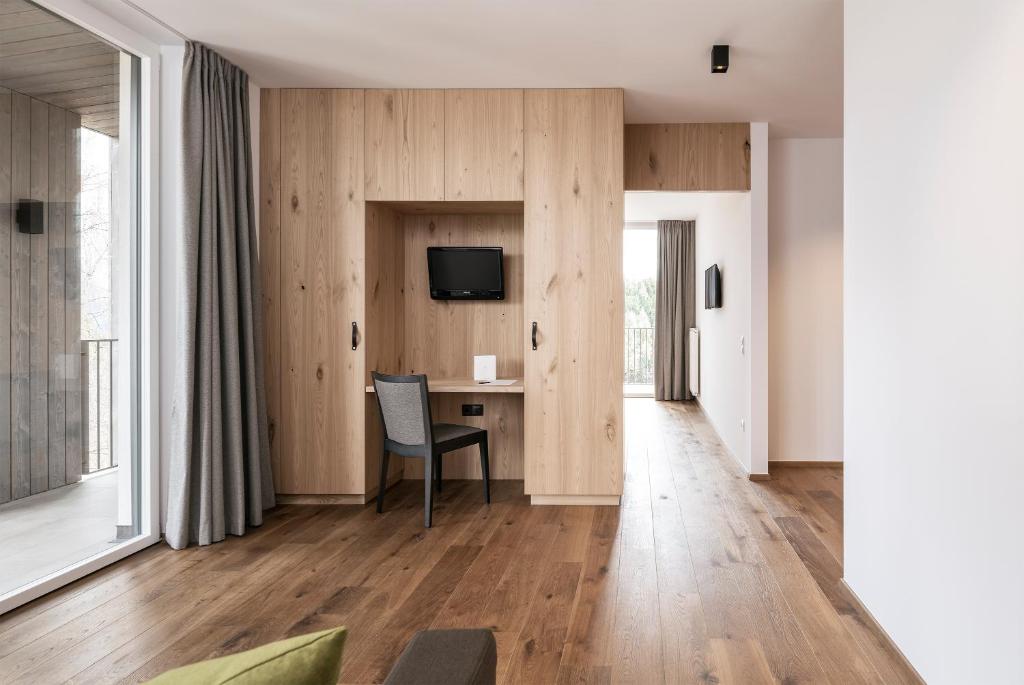 Televiisor ja/või meelelahutuskeskus majutusasutuses Hotel Lichtenstern