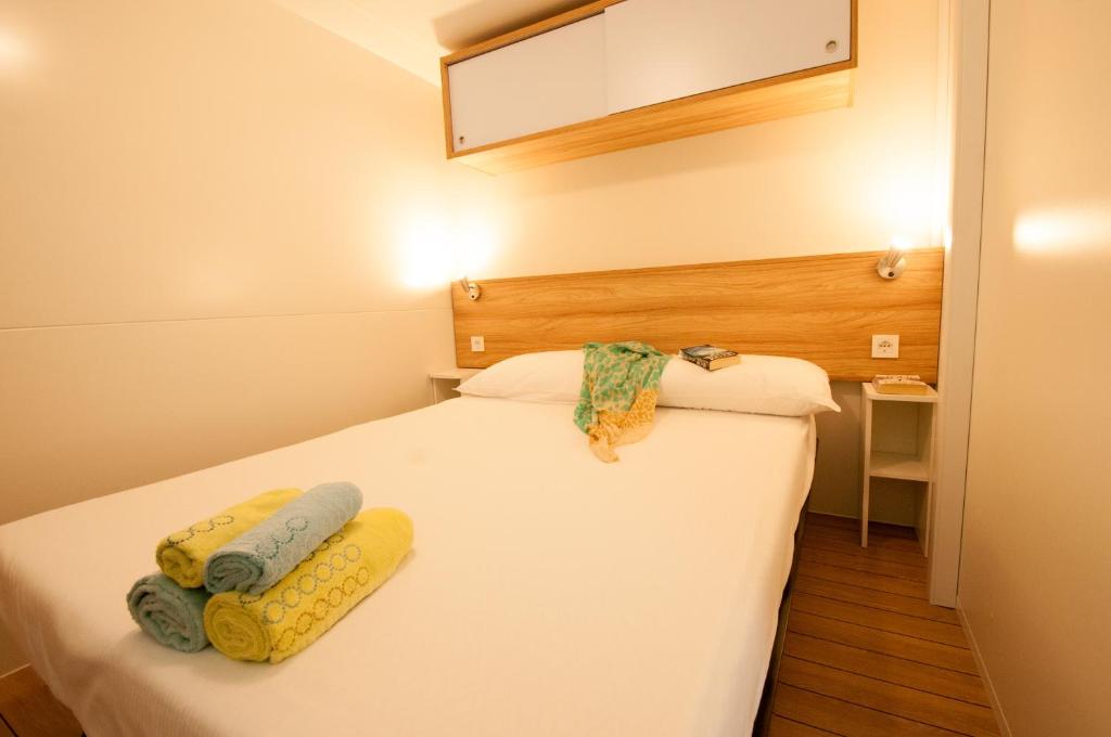 Voodi või voodid majutusasutuse Camping Serenissima toas