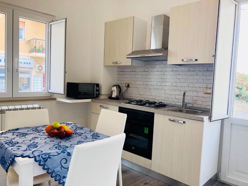 Kuchyň nebo kuchyňský kout v ubytování Residence Nina