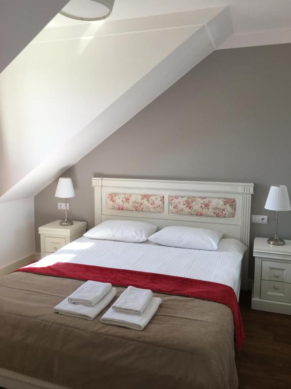 Postel nebo postele na pokoji v ubytování Perla Mare Apartamenty