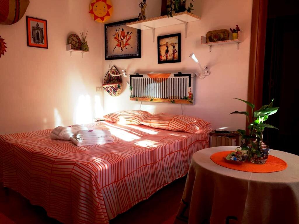 Postel nebo postele na pokoji v ubytování B&B Magna Grecia