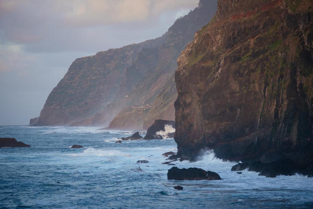 a view of the ocean with a mountain at CASAS MARE , Ponta Delgada, Madeira in Ponta Delgada