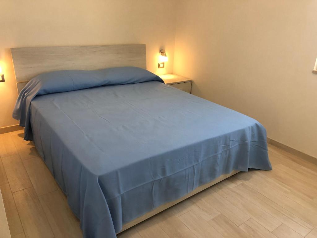 Postel nebo postele na pokoji v ubytování Casa Profumi di Puglia