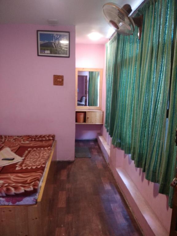 Postel nebo postele na pokoji v ubytování Hotel Jannat