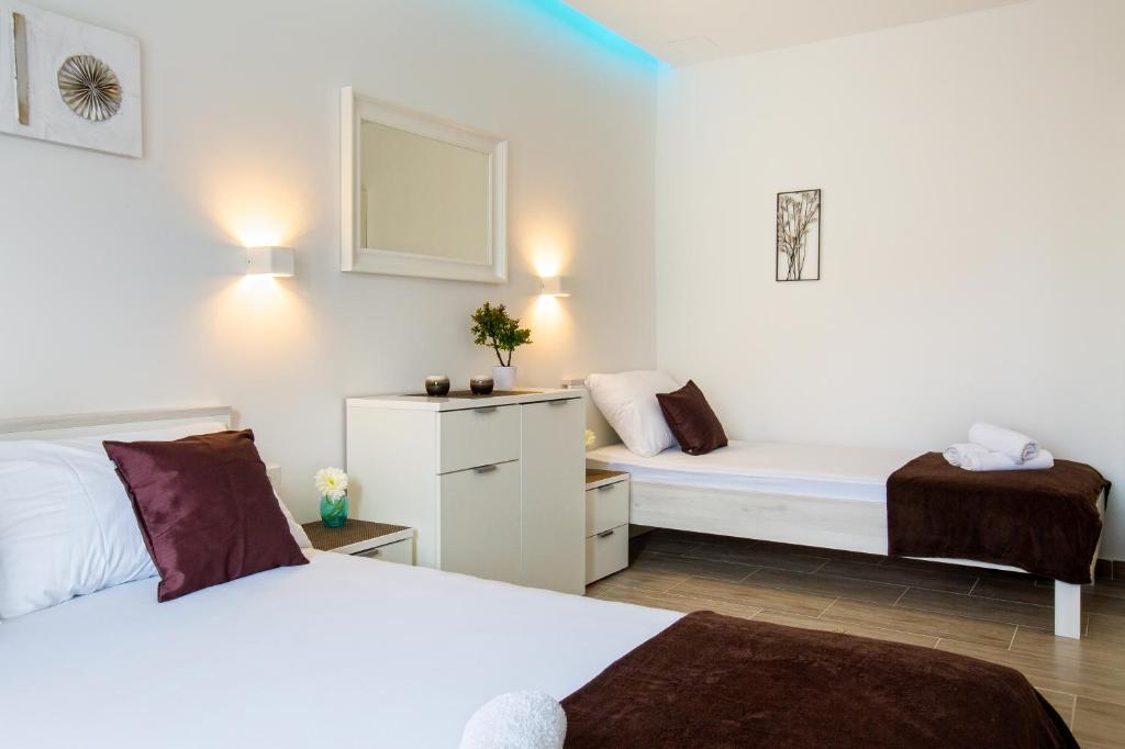Posteľ alebo postele v izbe v ubytovaní Apartment Nives in the City Center - Free Parking