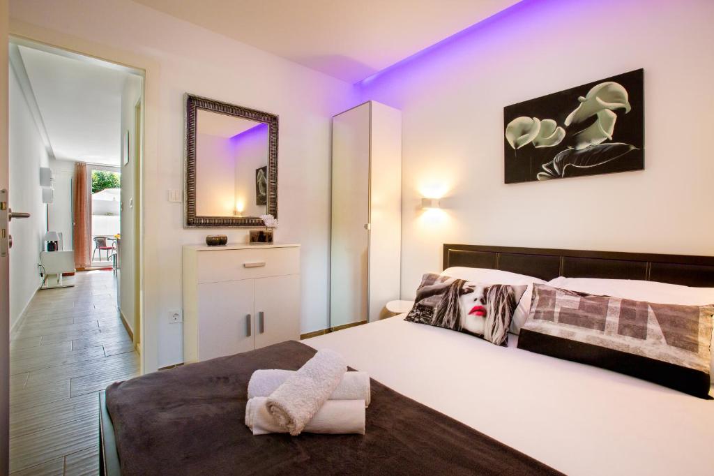 Posteľ alebo postele v izbe v ubytovaní Apartment Nives in the City Center - Free Parking