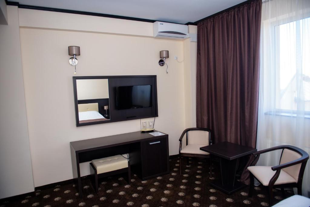 TV a/nebo společenská místnost v ubytování Hotel Maryiotis
