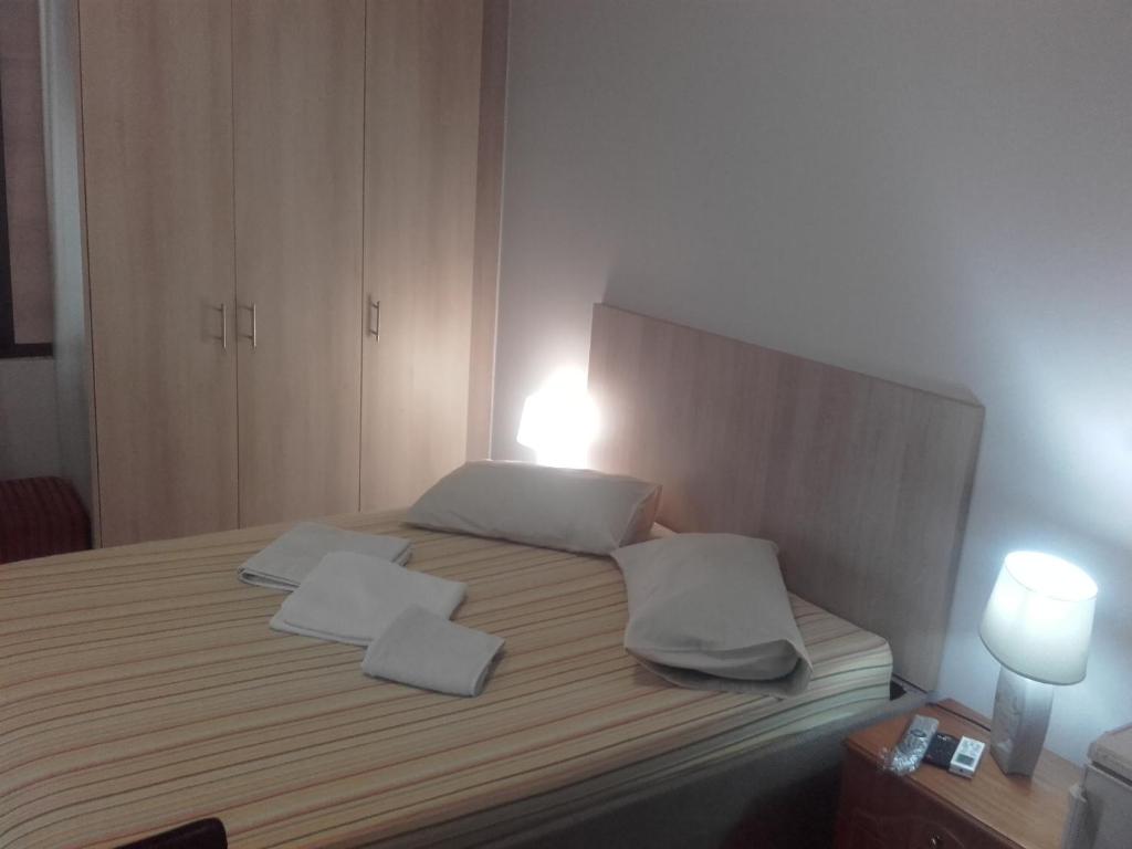 A bed or beds in a room at Teris Appartment