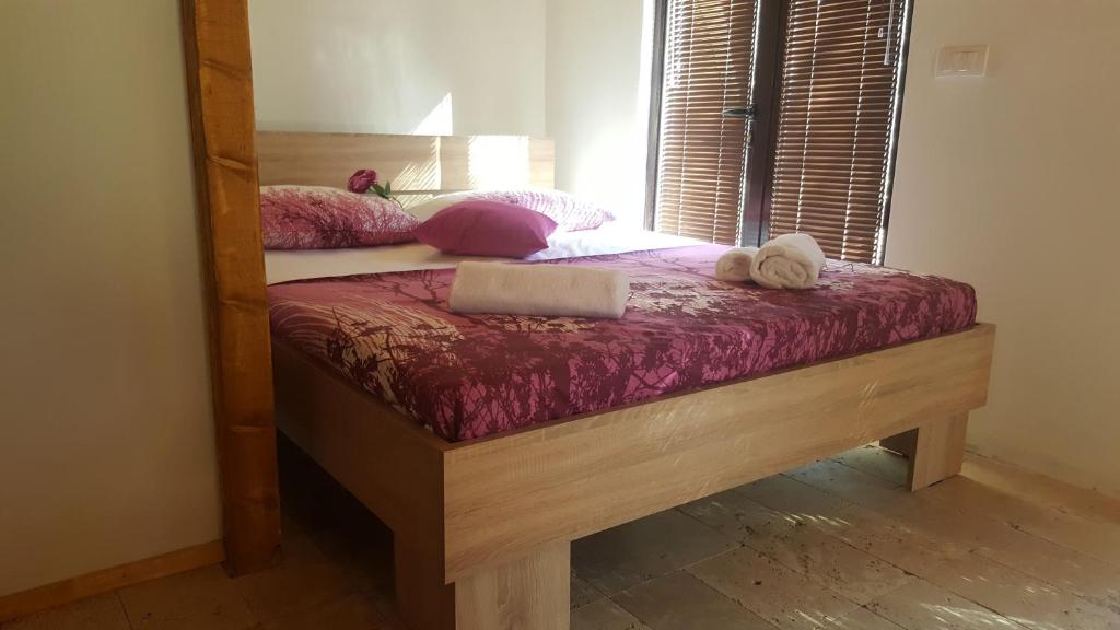 Postel nebo postele na pokoji v ubytování Olive Paradise