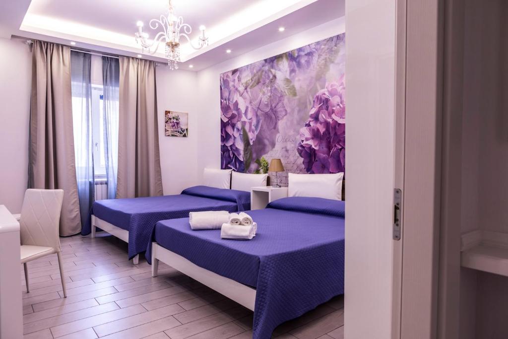 Un pat sau paturi într-o cameră la Maison De luxe