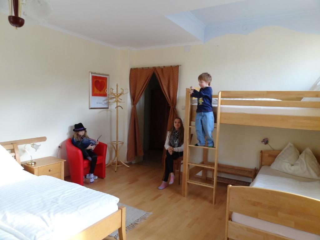 Postel nebo postele na pokoji v ubytování Gasthof Eschau