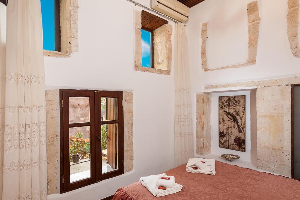 Postel nebo postele na pokoji v ubytování Hamam Suites Sifaka