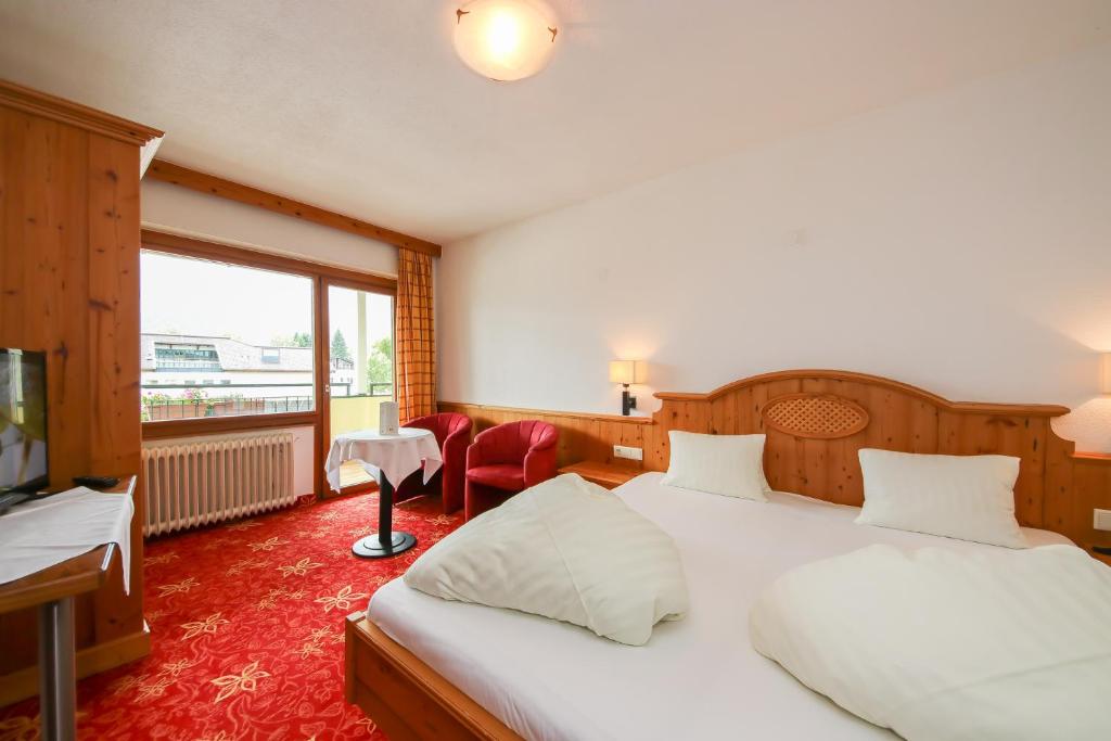 Posteľ alebo postele v izbe v ubytovaní Hotel Dax