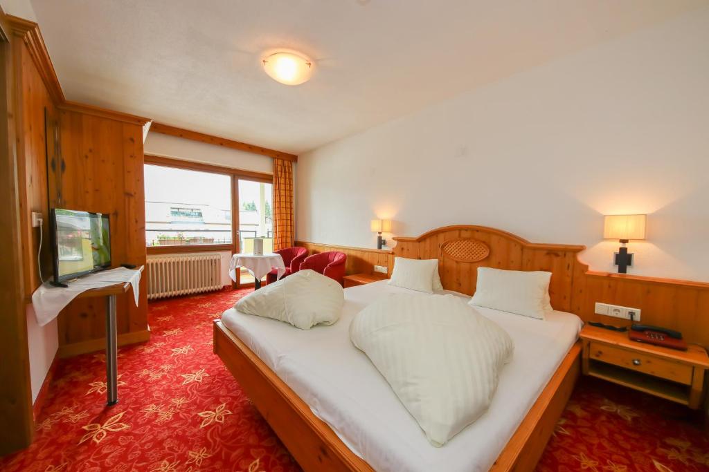 Posteľ alebo postele v izbe v ubytovaní Hotel Dax