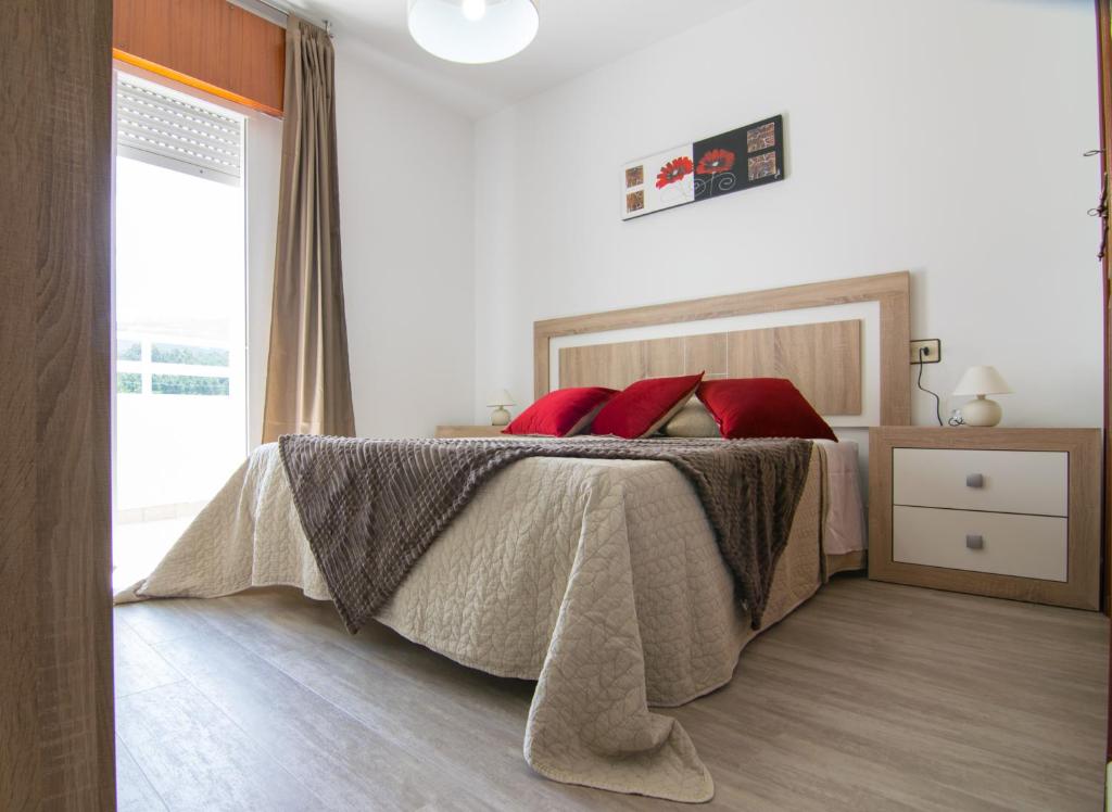 Posteľ alebo postele v izbe v ubytovaní Apto Playa de Coira