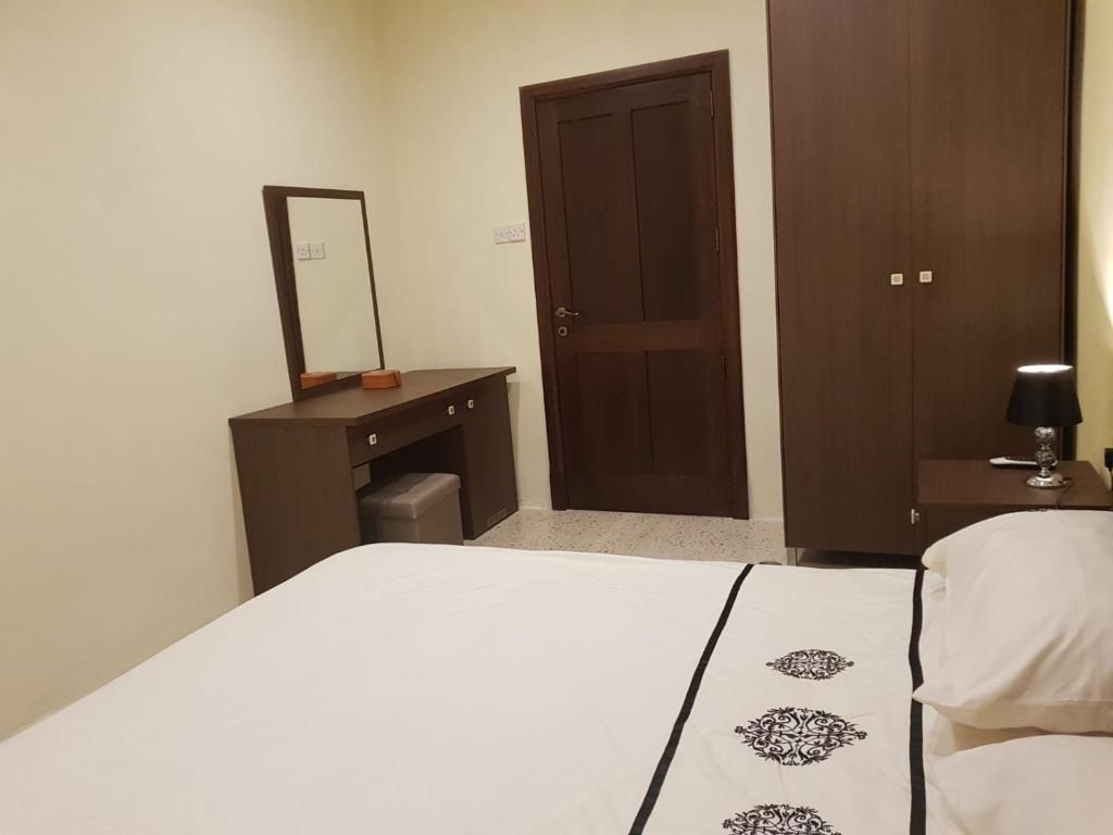 Postel nebo postele na pokoji v ubytování Merhba APT 3