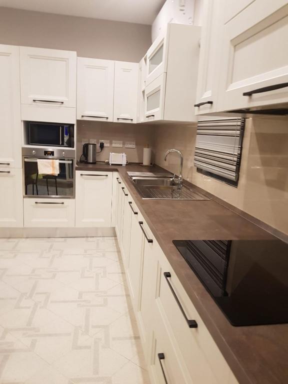 Kuchyň nebo kuchyňský kout v ubytování Merhba APT 3