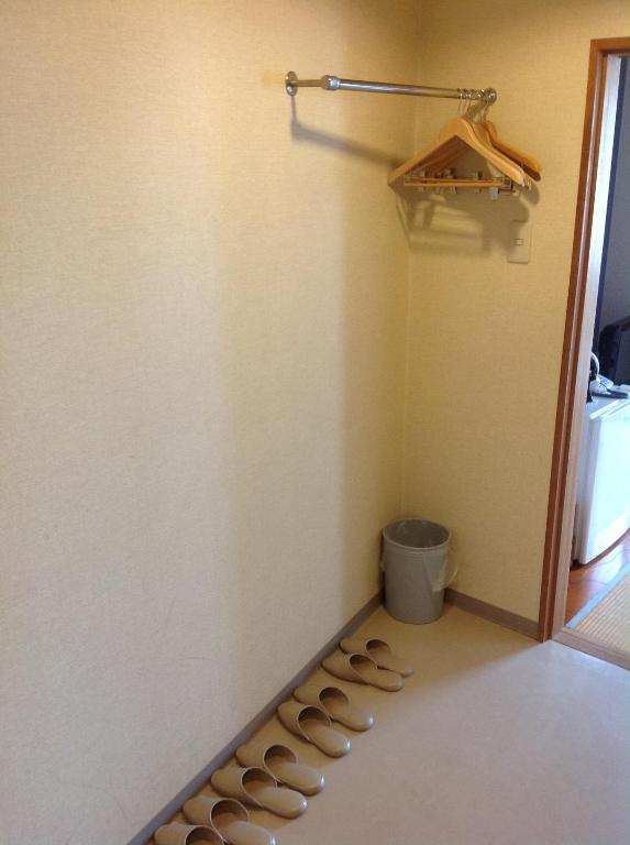 Postel nebo postele na pokoji v ubytování Hotel Hinodeya