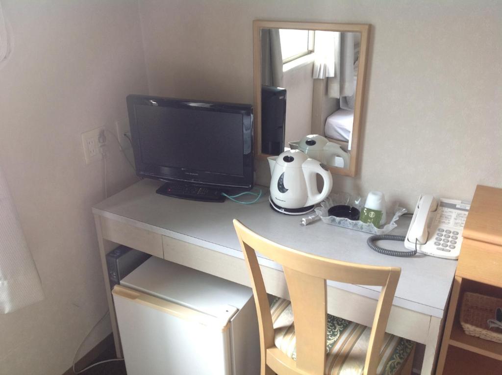 Příslušenství pro přípravu čaje a kávy v ubytování Hotel Hinodeya