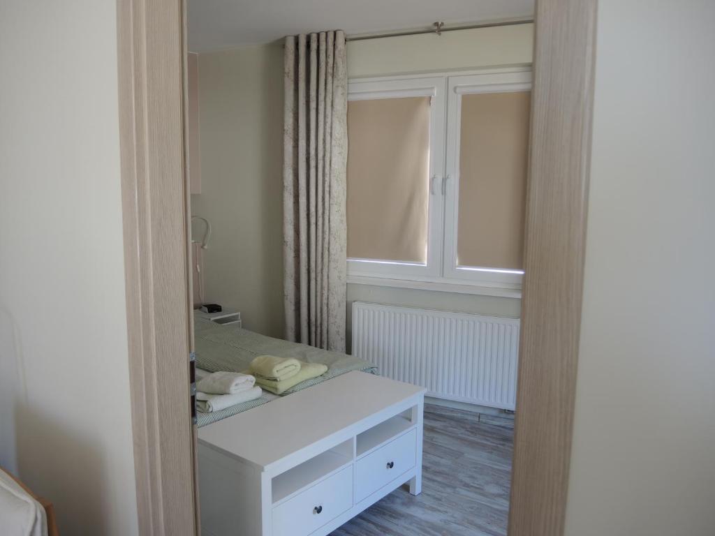 Posteľ alebo postele v izbe v ubytovaní Apartament Babitonga I