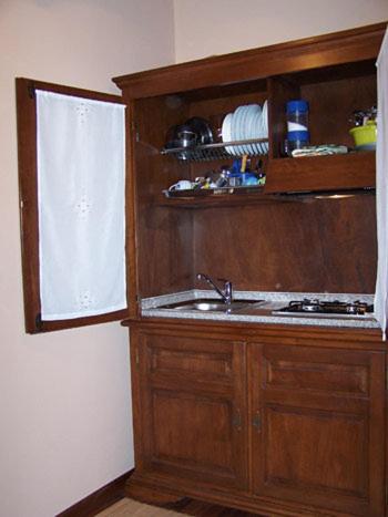 A kitchen or kitchenette at La Luna nel Borgo