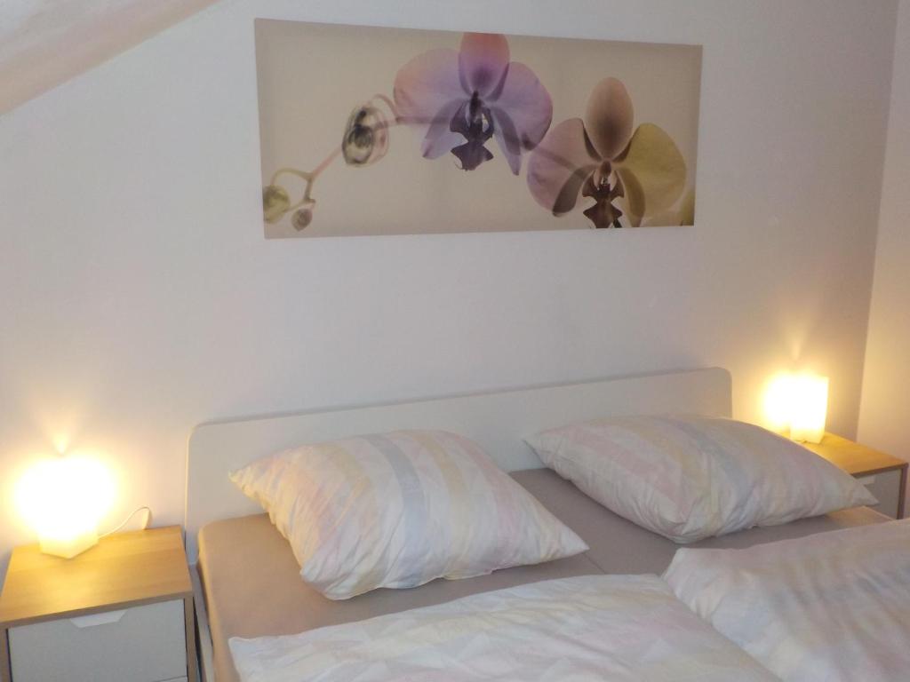 Postel nebo postele na pokoji v ubytování Gästezimmer Fechheim