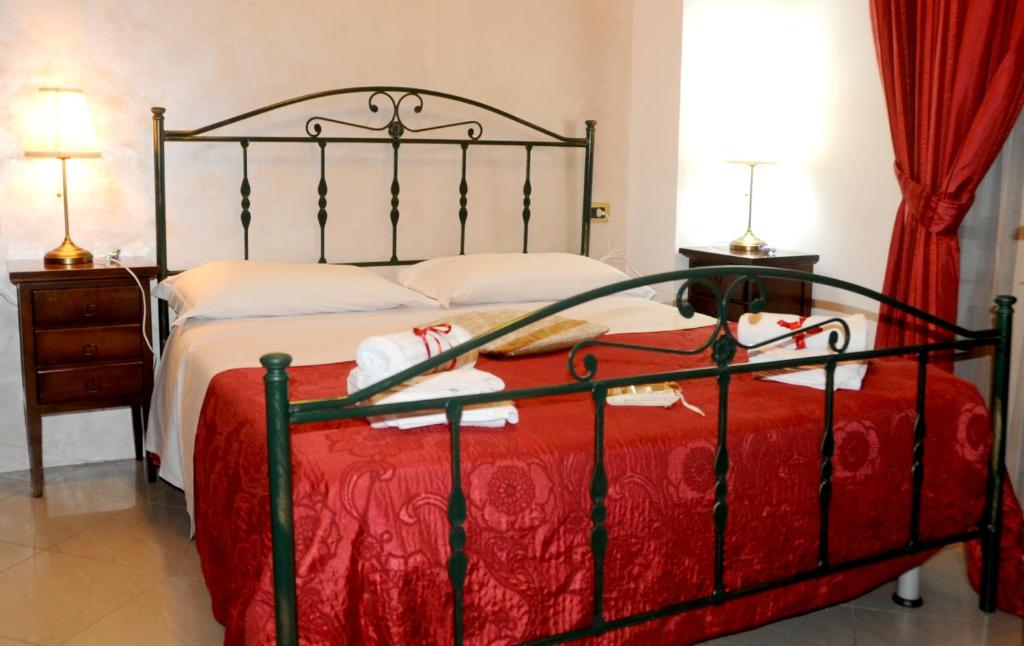 Postel nebo postele na pokoji v ubytování Garibaldi Relais