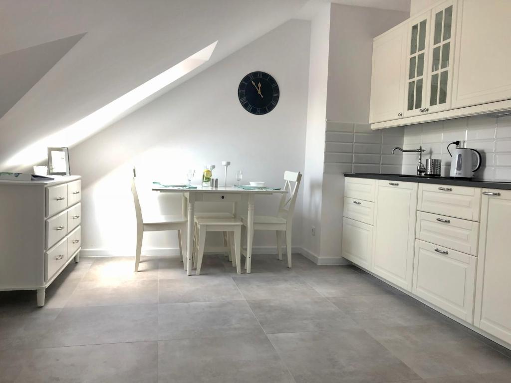 Kuchyň nebo kuchyňský kout v ubytování Apartament Julia