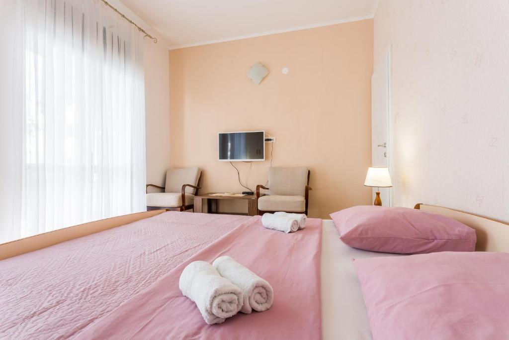 Postel nebo postele na pokoji v ubytování Guest house "Litus"