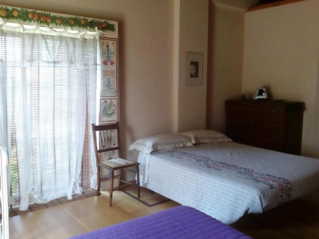 Łóżko lub łóżka w pokoju w obiekcie Antico Casale dei Sogni agriturismo