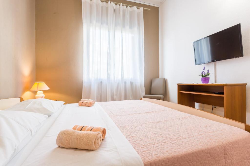 Postel nebo postele na pokoji v ubytování Guest house "Litus"