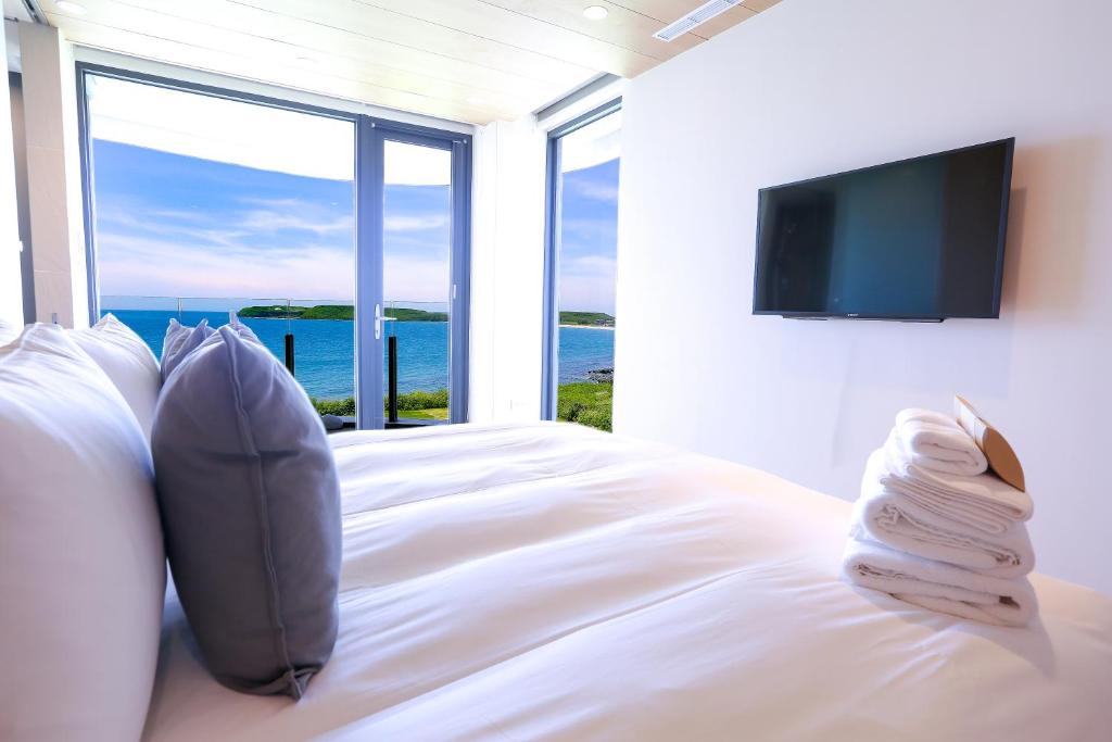 TV a/nebo společenská místnost v ubytování Laguna Villas & Resorts
