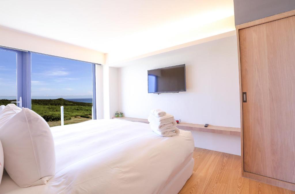 TV a/nebo společenská místnost v ubytování Laguna Villas & Resorts