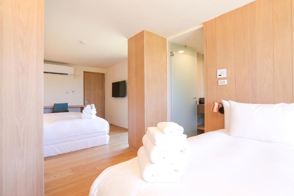 Postel nebo postele na pokoji v ubytování Laguna Villas & Resorts