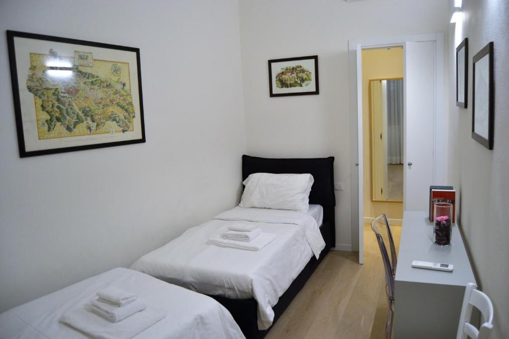 Posteľ alebo postele v izbe v ubytovaní Opera 19 Luxury Apartment
