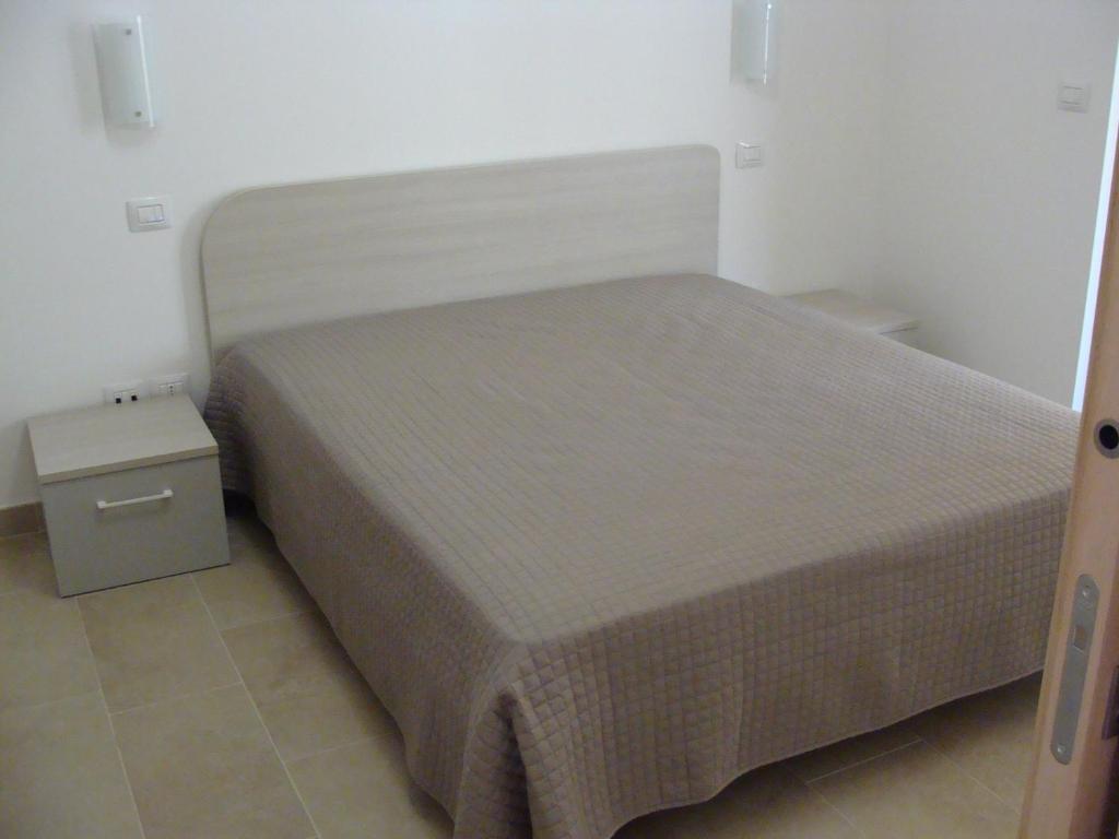 Łóżko lub łóżka w pokoju w obiekcie MareVasto - appartamento Vasto Marina