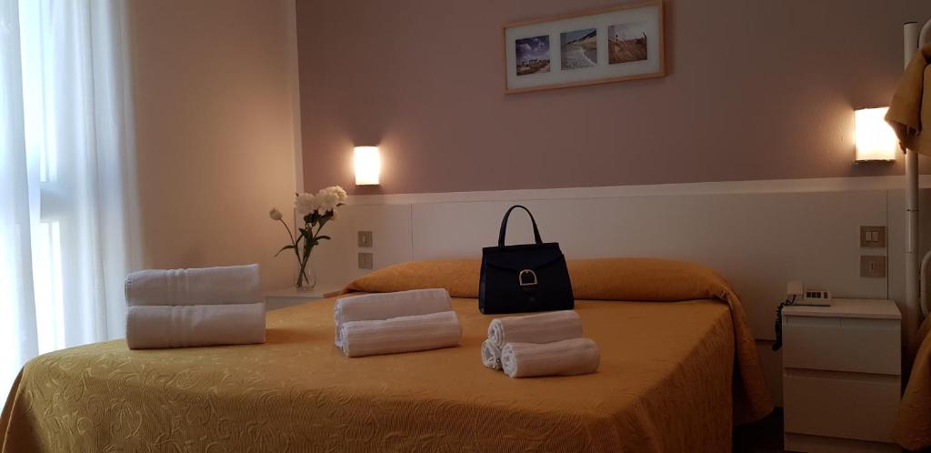 Postel nebo postele na pokoji v ubytování Hotel Haiti