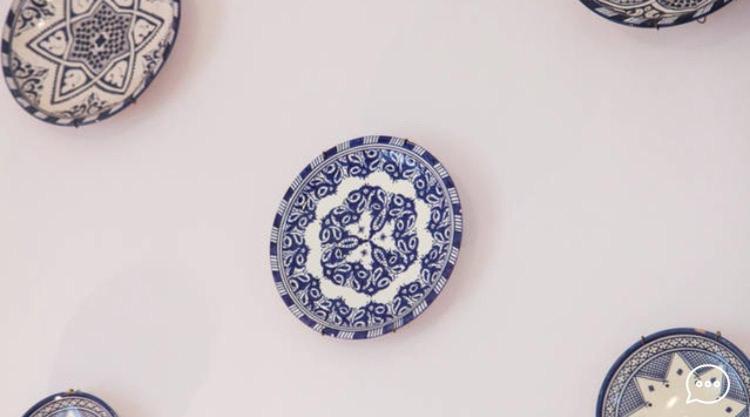 a group of blue and white plates on a wall at Le Terrazze in Otranto