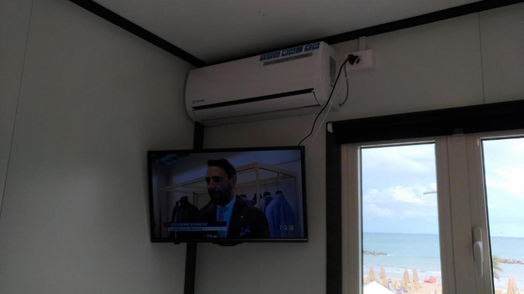 TV a/nebo společenská místnost v ubytování Camping Borghetti
