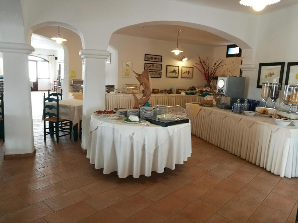 Zona de estar de Hotel Resort Nuraghe Arvu