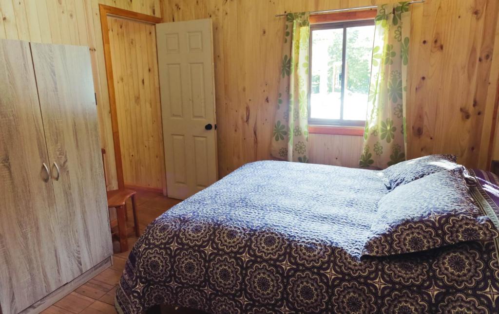 Letto o letti in una camera di Llaima Camp