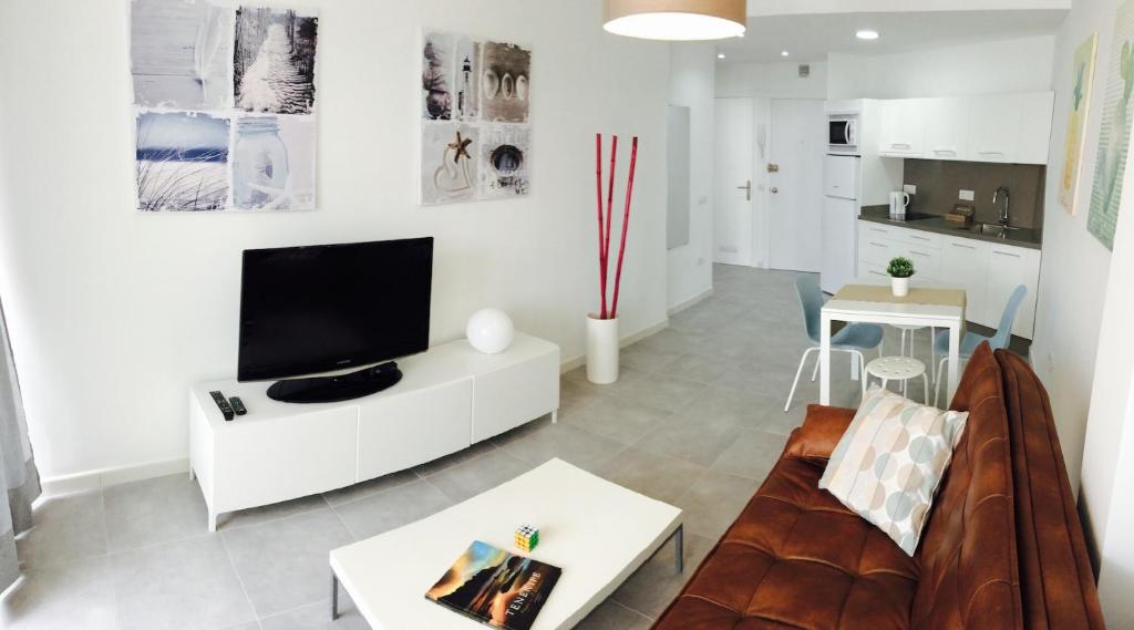 A television and/or entertainment center at Apartment Carmen Sunrise, Los Cristianos