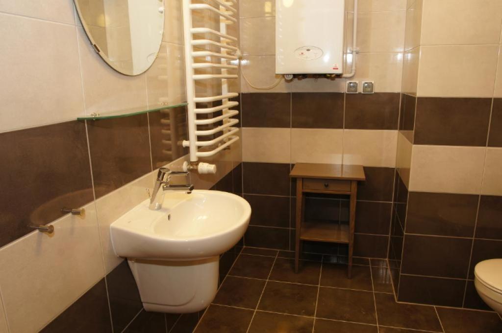 Kúpeľňa v ubytovaní Apartament Jedynka