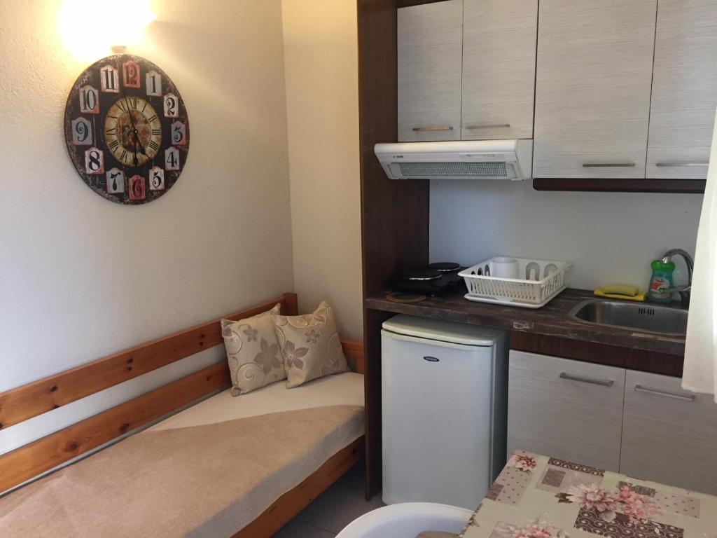 Kuchyň nebo kuchyňský kout v ubytování Hotel Alexandros II