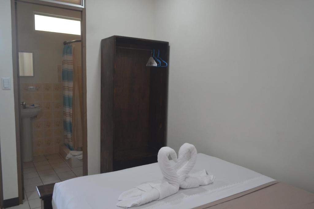 Postel nebo postele na pokoji v ubytování Hotel Don Fito