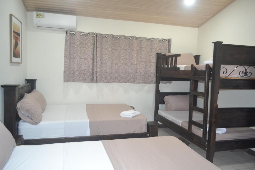 Postel nebo postele na pokoji v ubytování Hotel Don Fito
