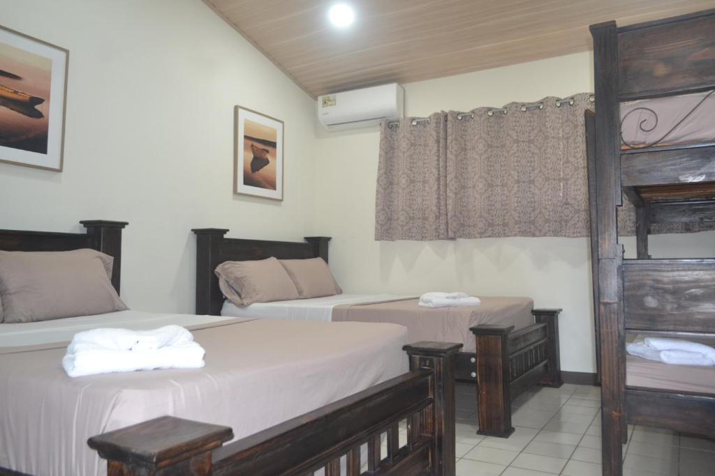 Postel nebo postele na pokoji v ubytování Hotel Don Fito
